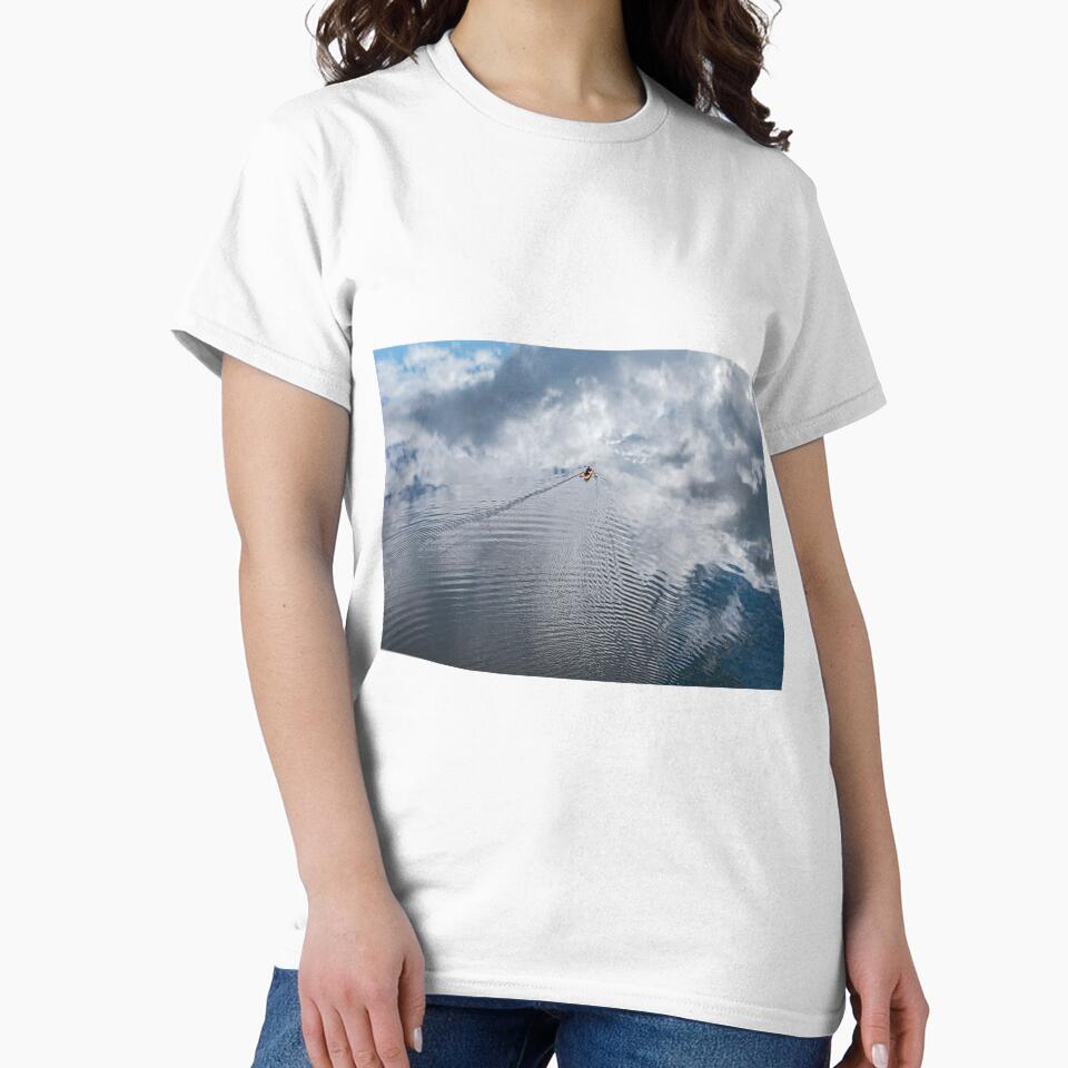 Kayak into clouds by John Van Den Broeke